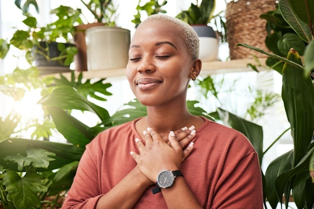 woman-plants-inner-happiness-mindfulness.jpg